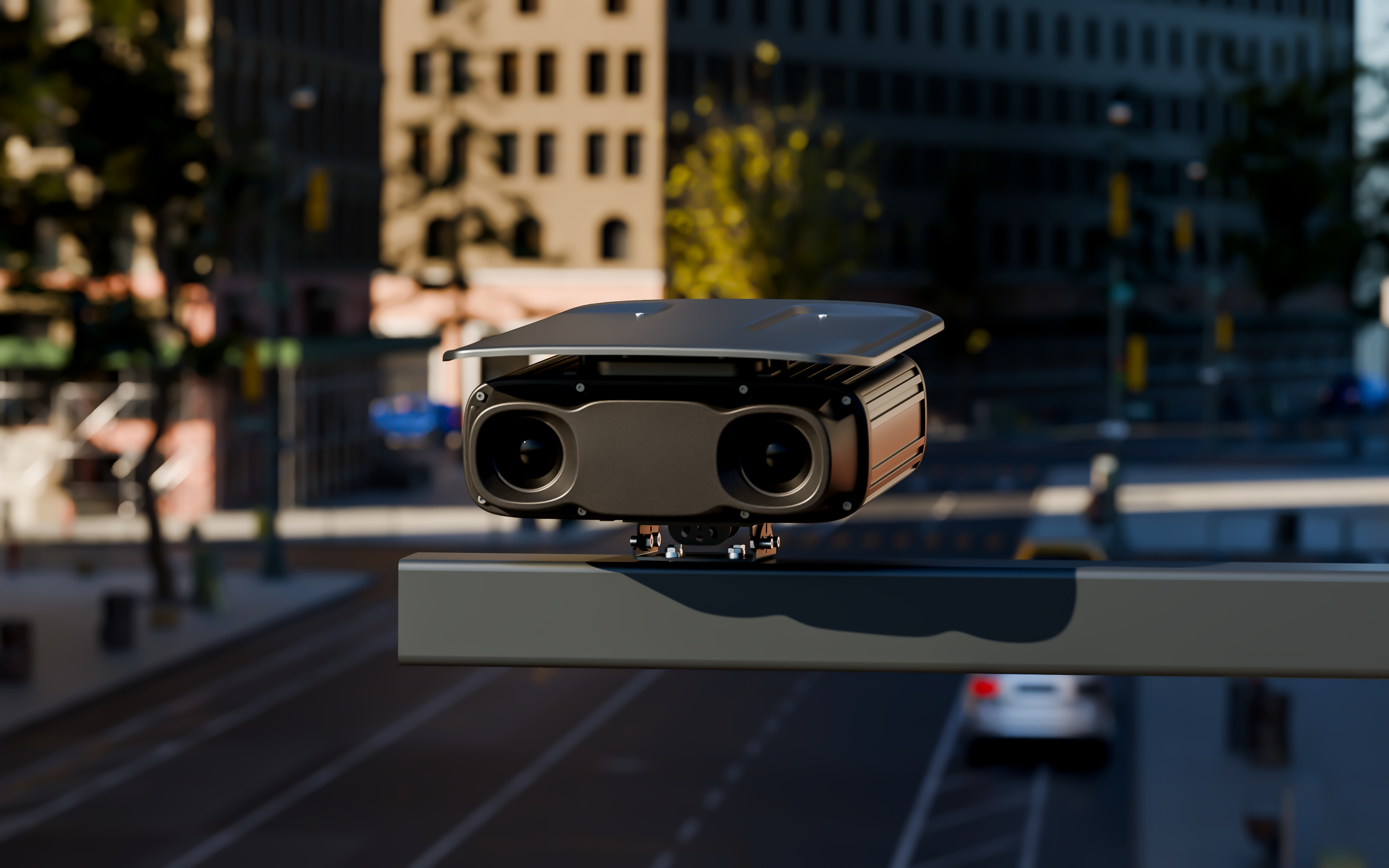 Close-up of the Box Spotter dual-lens unit mounted over a city road