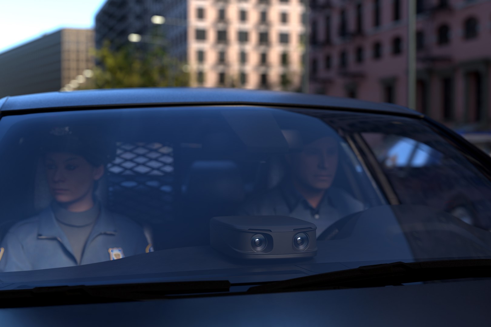 Ekin X Spotter dual-lens unit mounted on the windscreen of a patrol vehicle in a city street