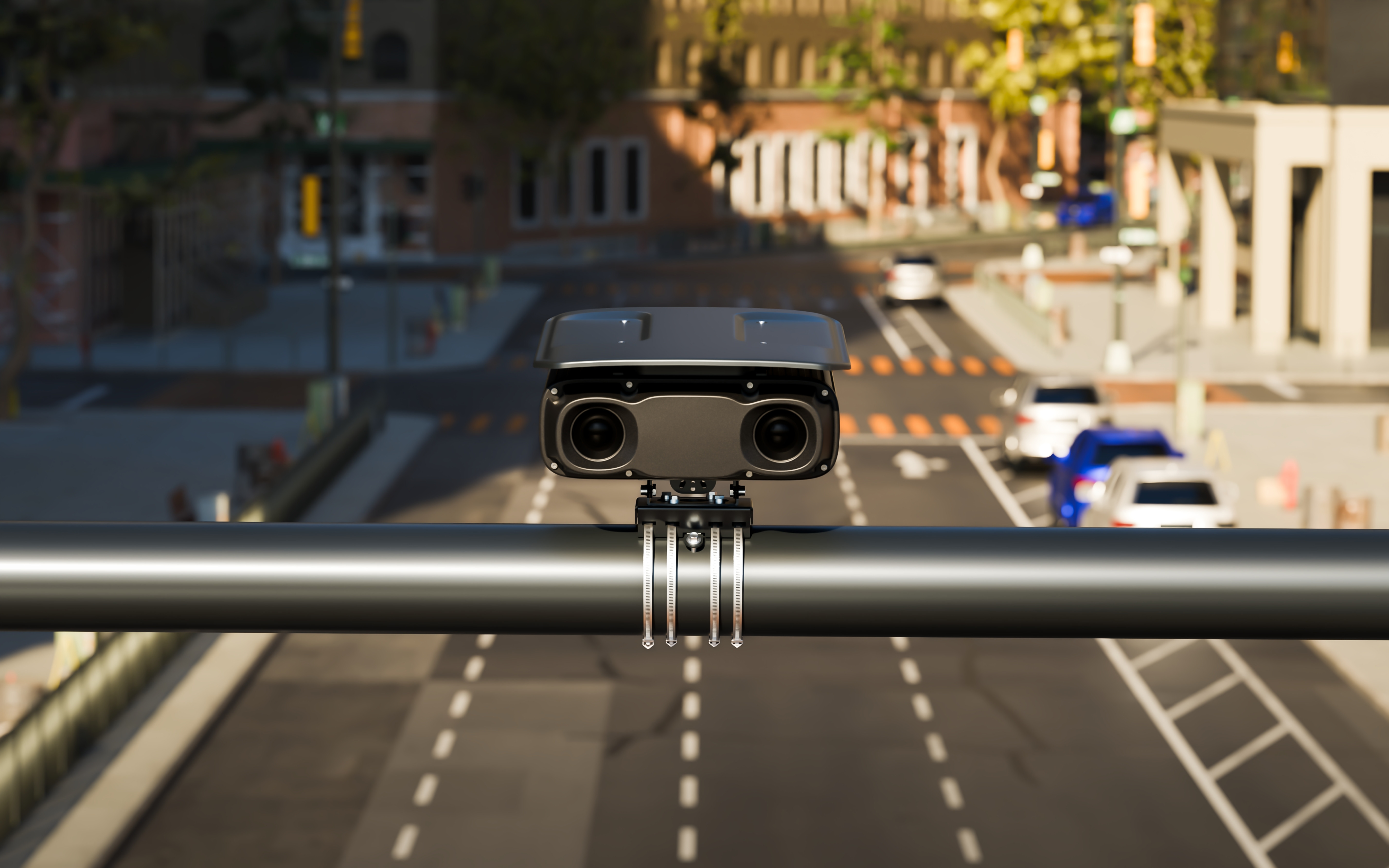Box Spotter clamped to a gantry rail above a multi-lane city road